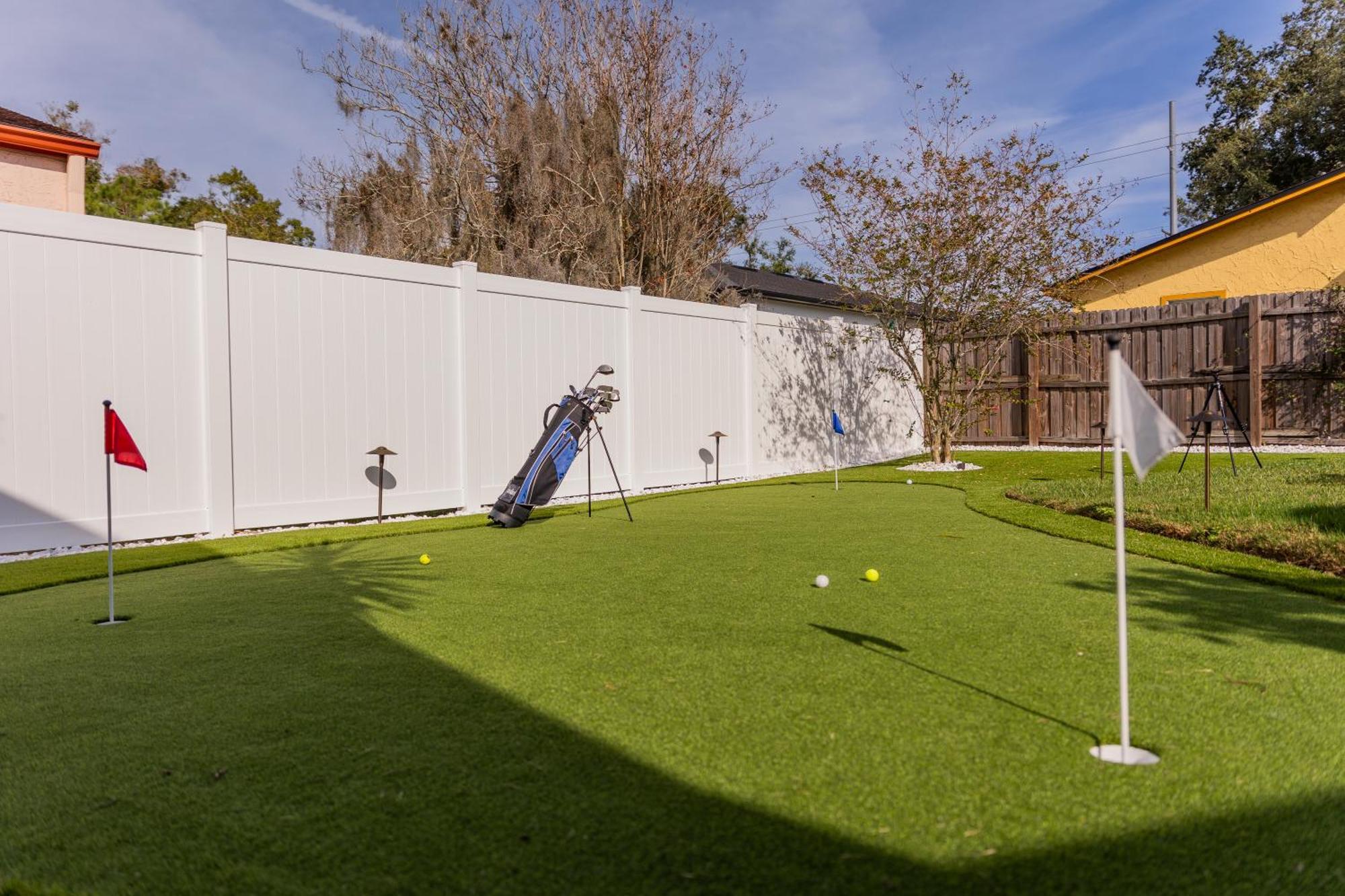Upscale Bay Dream Pool With Putting Green