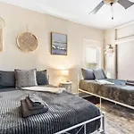 Four Different Options At One Great Location-- 1 - Spacious 3 Bed 2 Bath House Or 2- 2Nd Floor 2 Bed 1 Bath Guesthouse Or 3- 1St Floor Studio Or 3- A Tiny Home Rv