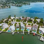 Waterfront Luxury W/ Heated Salt Pool & Golf Cart