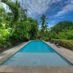 Waterfront Pink House With Private Dock & Pool