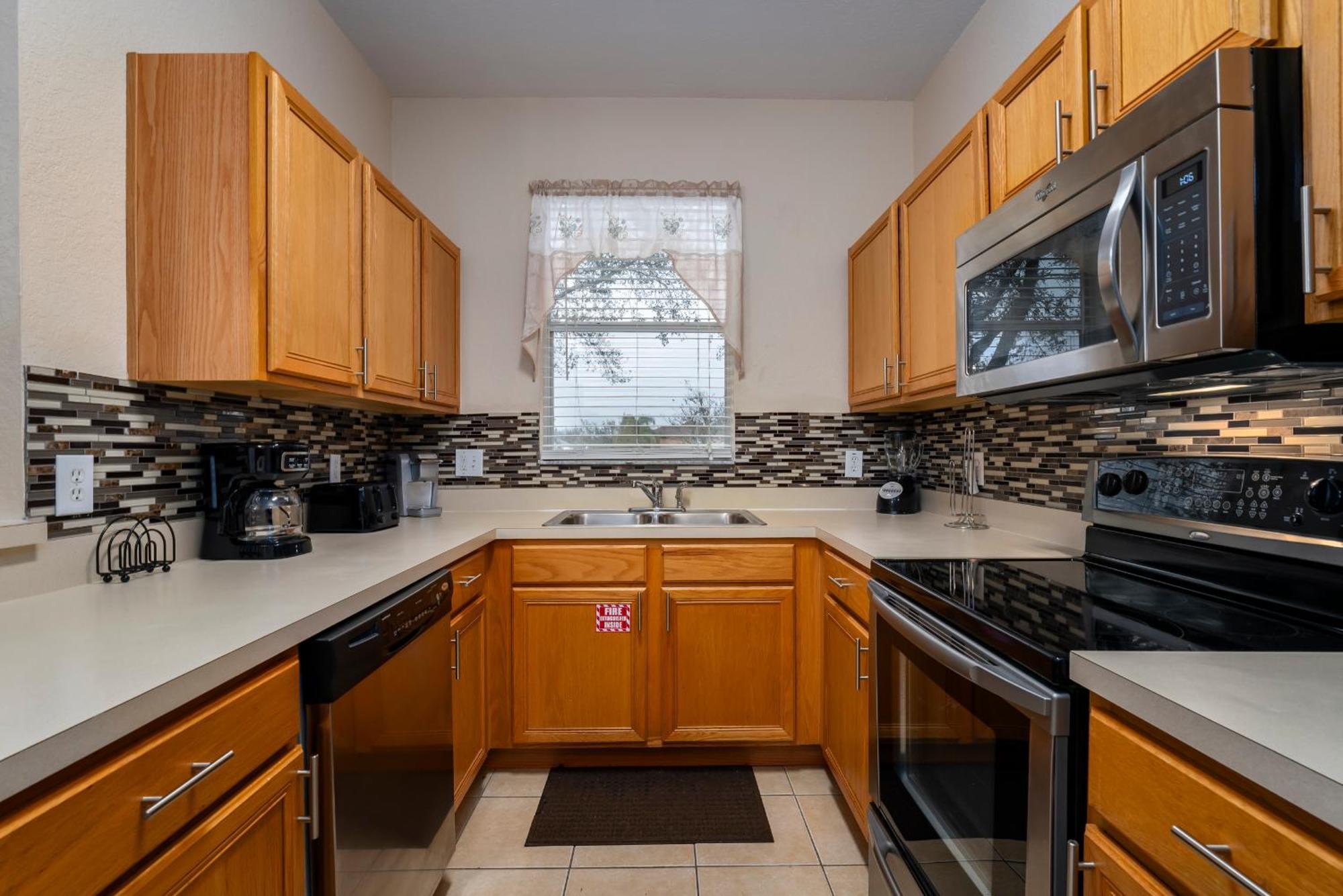 Holiday home Spacious And Upgraded Regal Palms Townhome 4br,3ba *