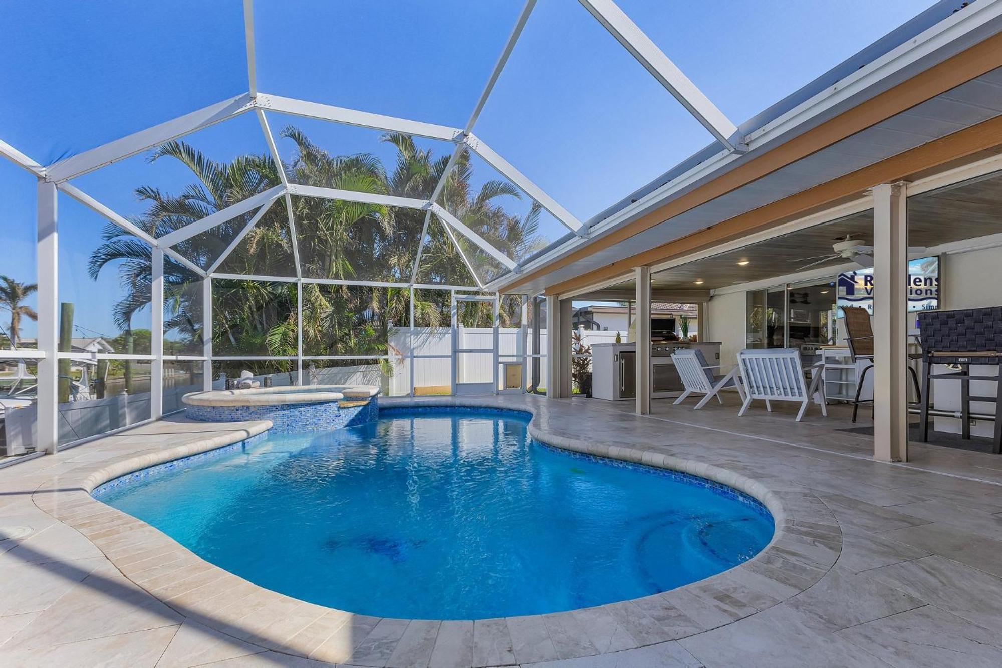 Gulf Access Dock With Tiki Heated Pool Casa Chillotta Roelens Holiday home Cape Coral