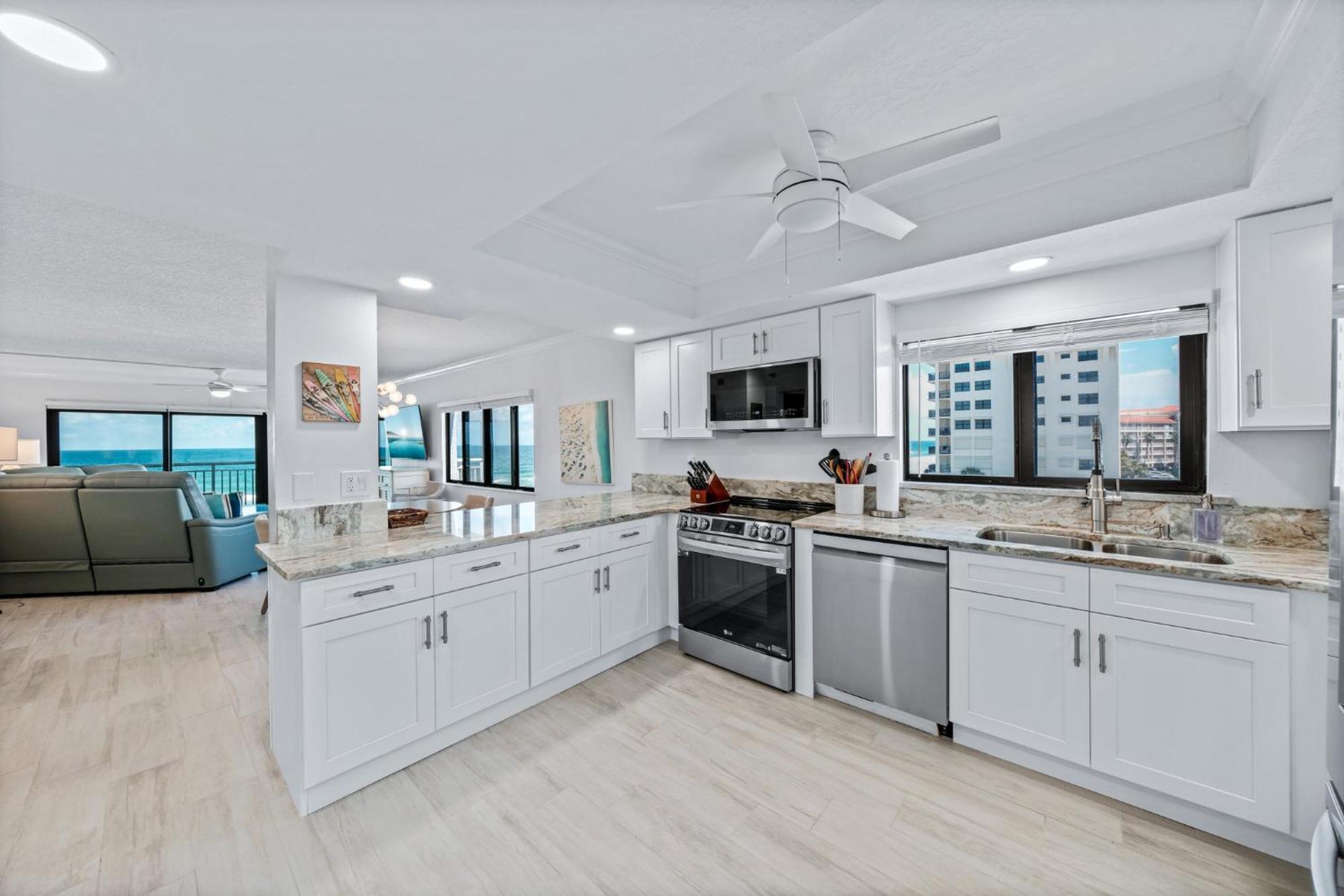 Holiday home Corner Oceanfront Views With Wrap Around Balcony Located On The No-drive Beach!