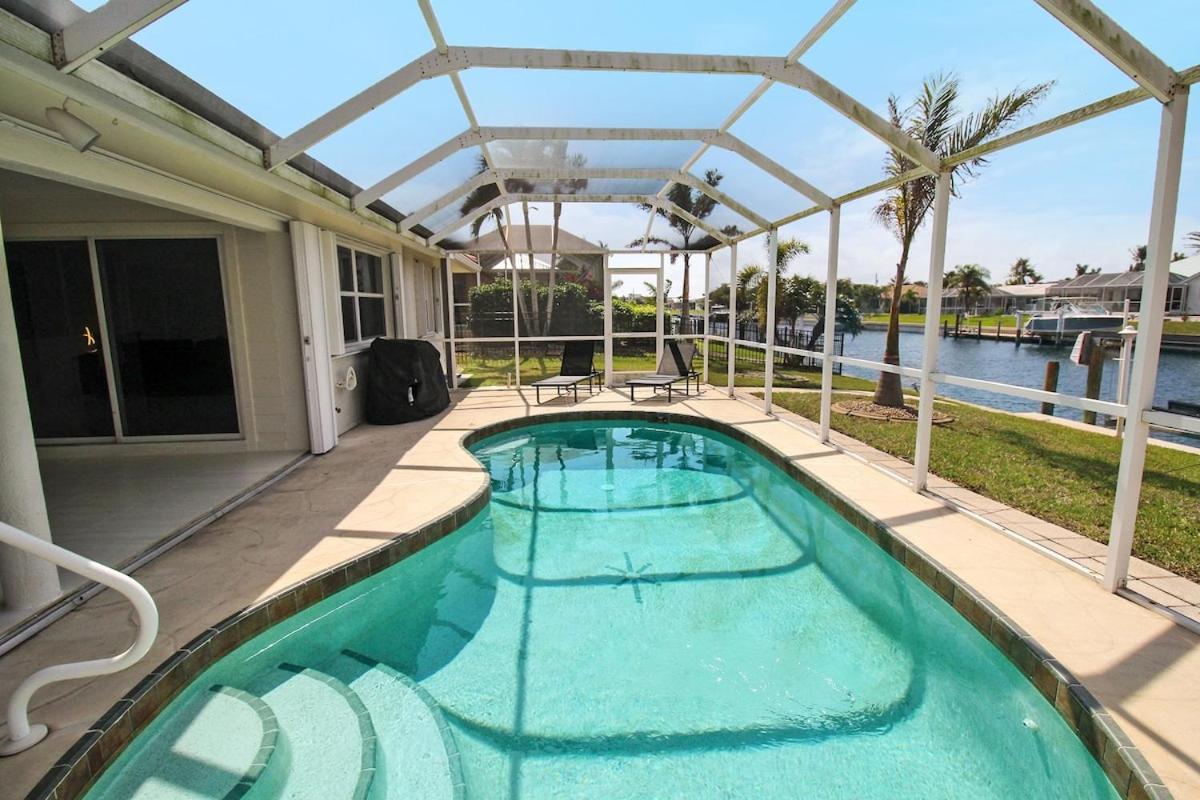 Chic & Modern Canal-front Retreat With Private Pool - Azure Tides Holiday home Punta Gorda